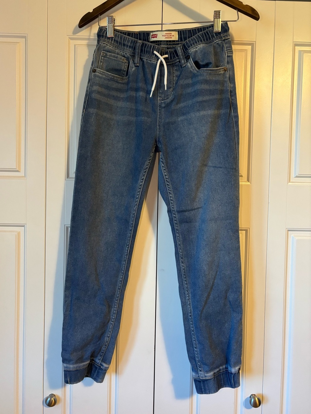 Levi’s, medium wash jogger style jeans